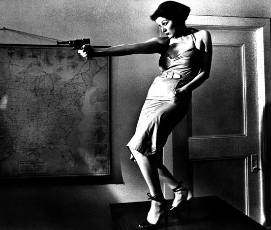 Patti Astor with Gun.